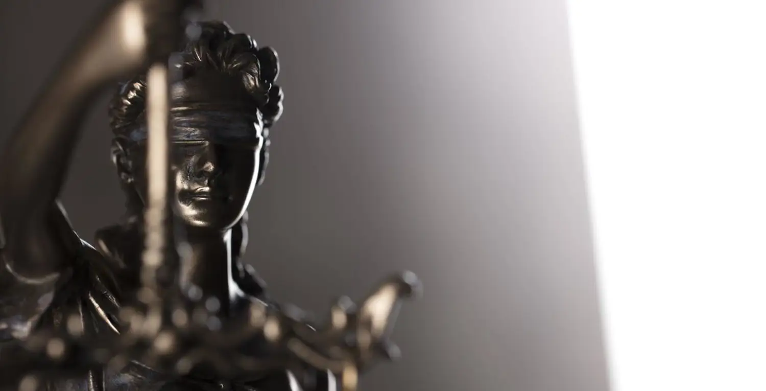 gavel, scales of justice, gray stone background